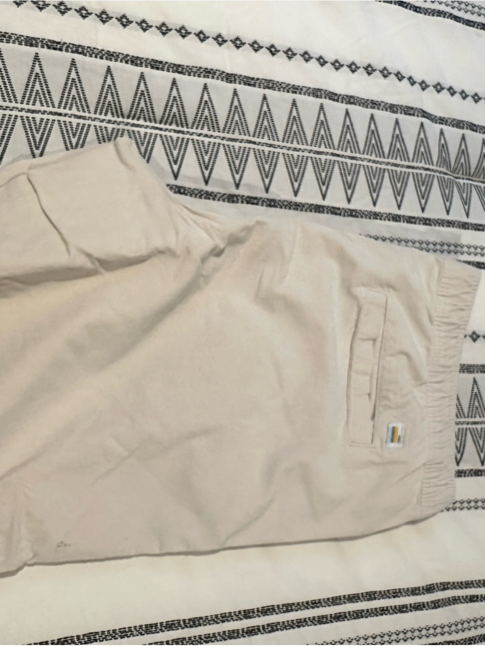 Vuori Men's Light Beige shorts.